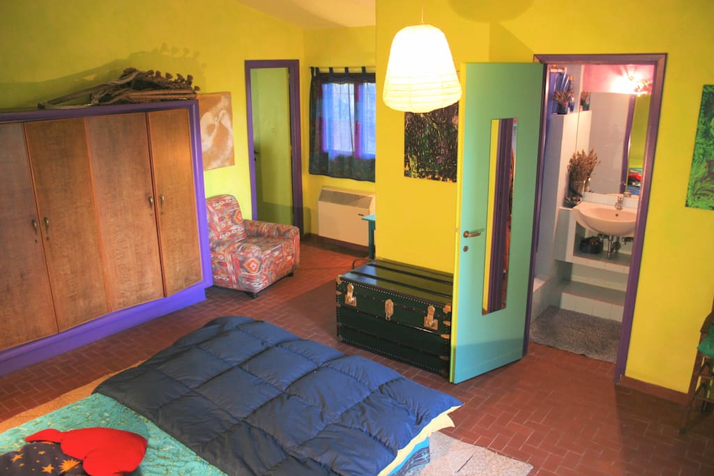 your cozy, colored, artistic bedroom in the two-rooms independent part of the house