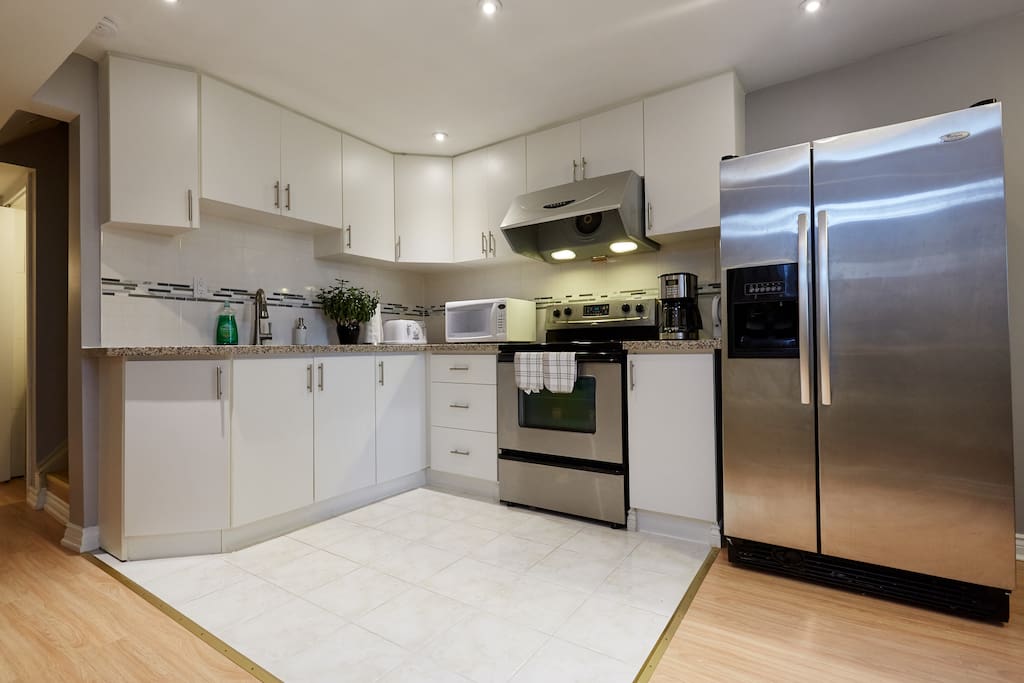 kitchen , cooking hardware, utensils, microwave, brand new toaster, coffee maker, kettle . It is all set up for you.