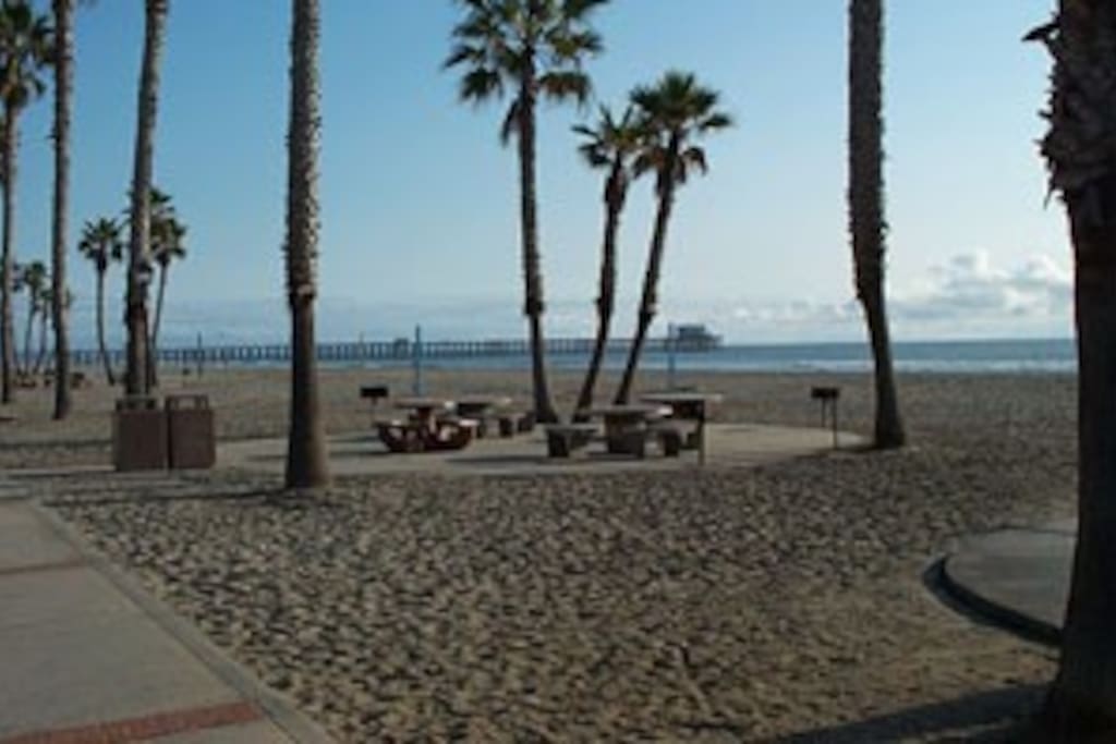 Beach in front of condo, pier is in the background