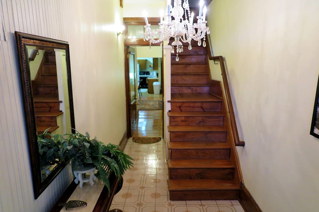 The apartment has the lower-level entryway. (There are stairs inside.)