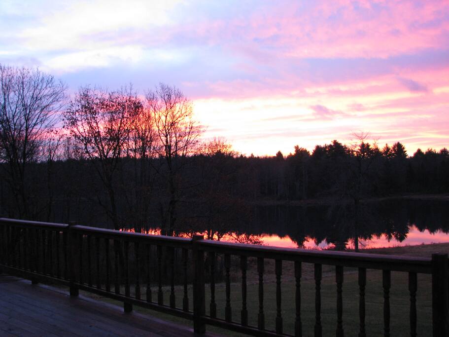 Sunrise over lake looking off the deck.