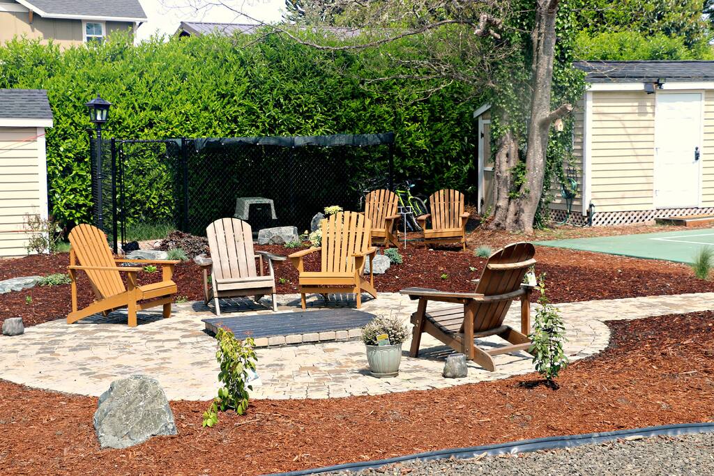 Backyard fire pit and dog kennel