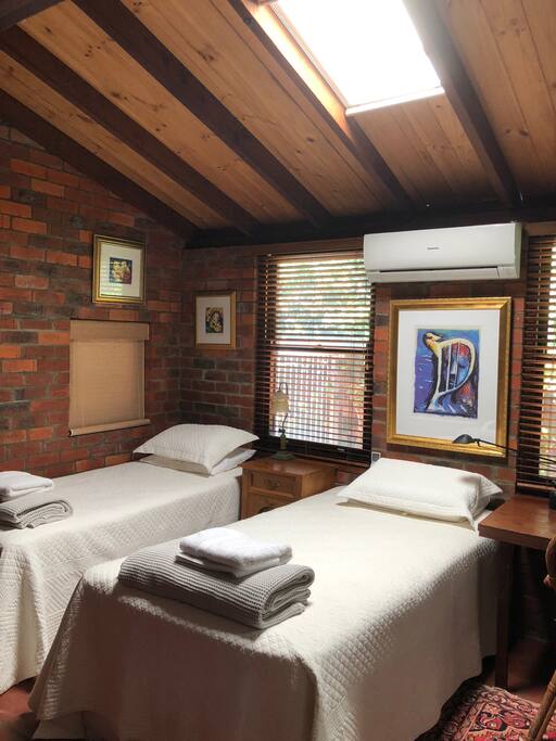 King bed for couples coverts to 2 king singles for singles. Adjustable sky light for complete light/darkness.