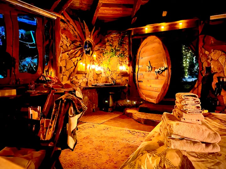Battery operated candles and lanterns light the Hobbit hole near San Diego, California