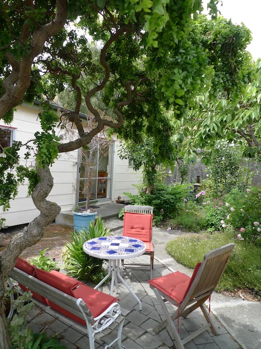 Garden seating outside guesthouse