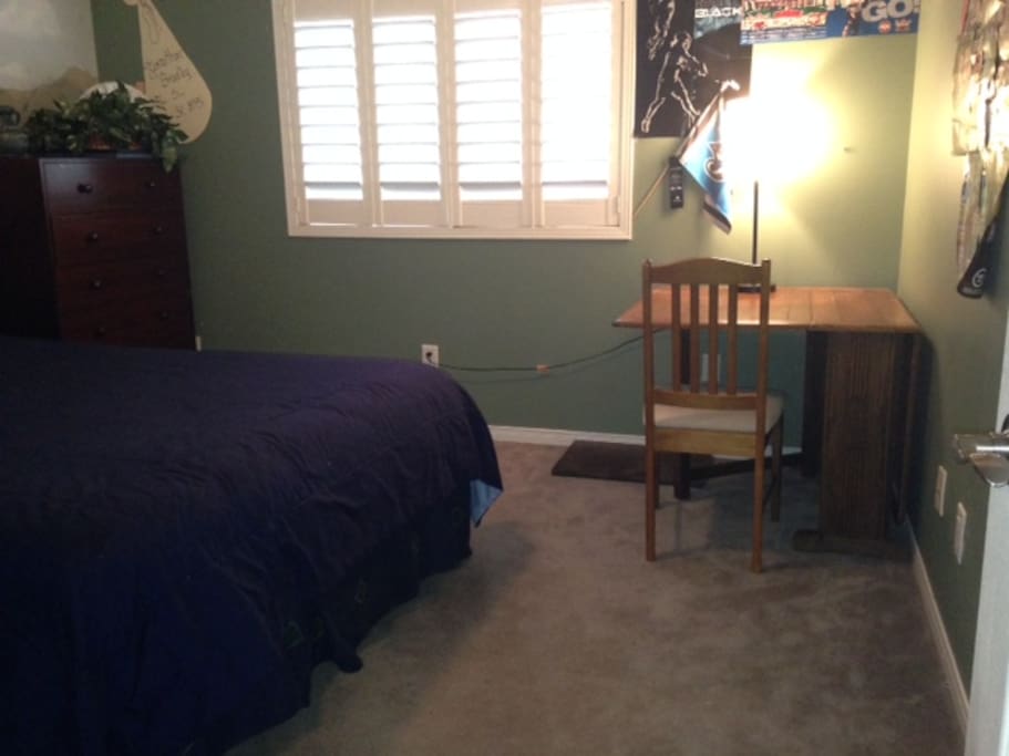Spacious 15' x 14' bedrooom with comfortable queen bed.