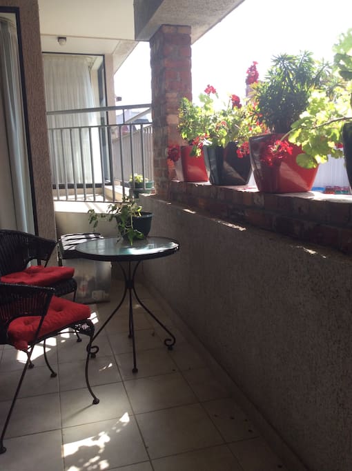 The lower balcony in autumn. The main bedroom balcony is in the background.