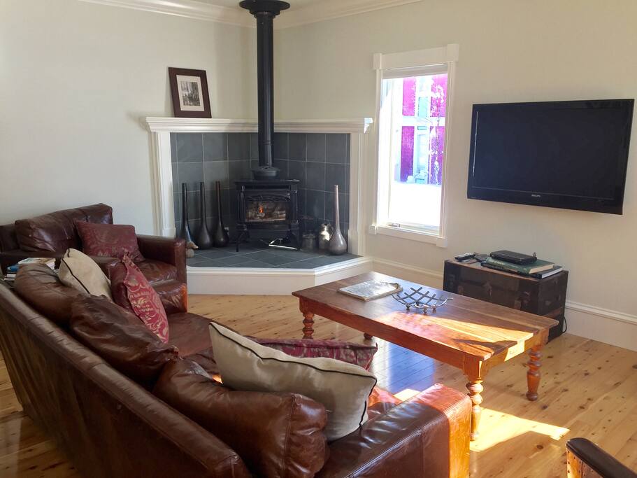 Living room with gas stove.
