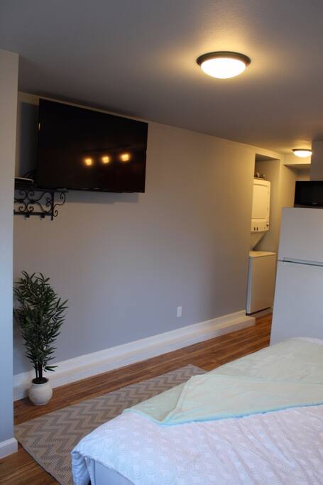 TV on wall mount with cable
