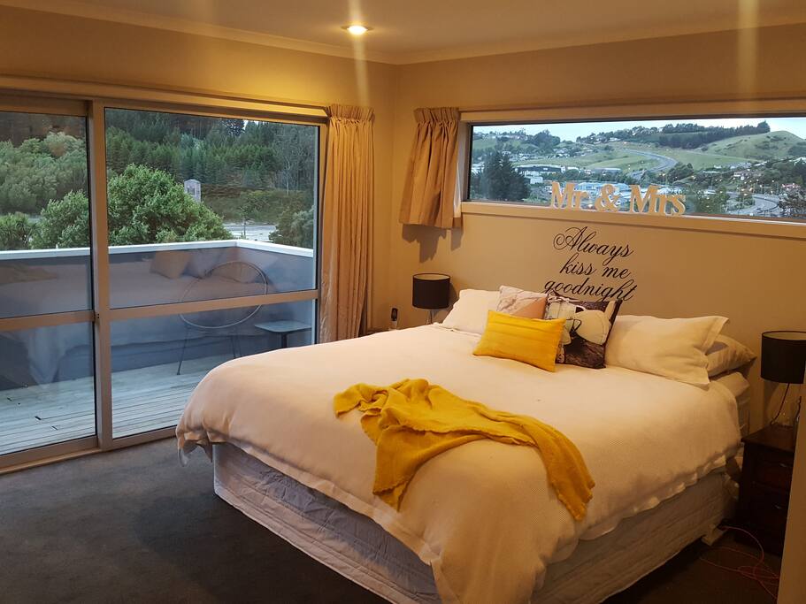 Master Bedroom with Super King Bed. Doors opening out onto deck