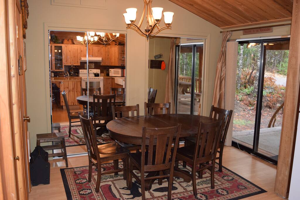 Dining area with sliding doors to front deck.