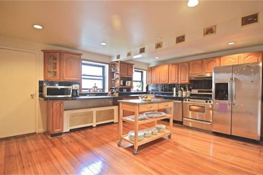 Kitchen located on garden level with access to backyard