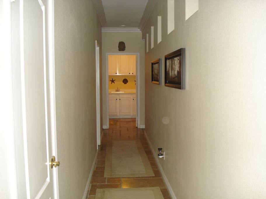 Hallway leading to the laundry and private bathroom/bedroom
