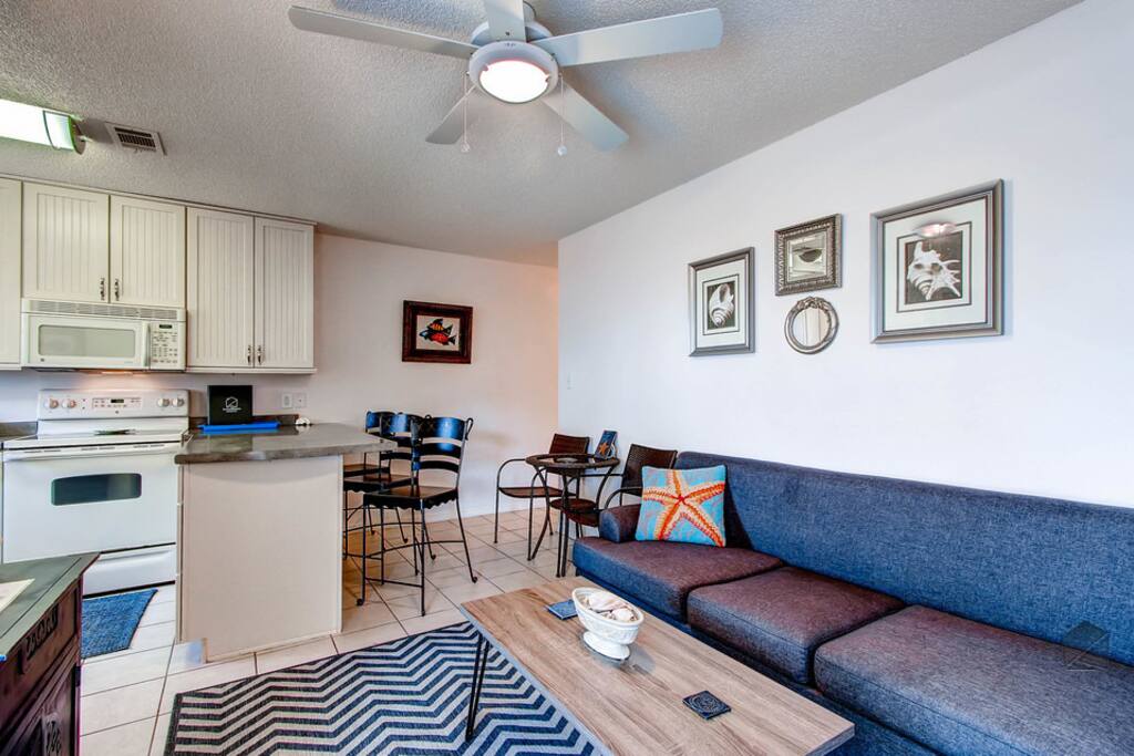 The open layout makes it easy to move between the kitchen and the living room.