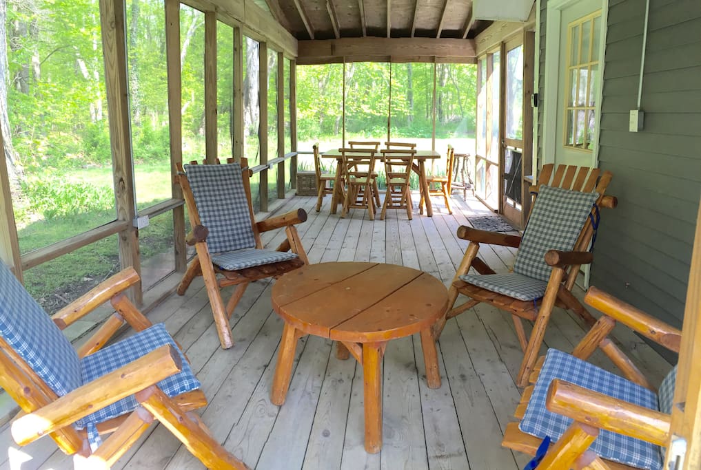 Large screened in porch with eating area