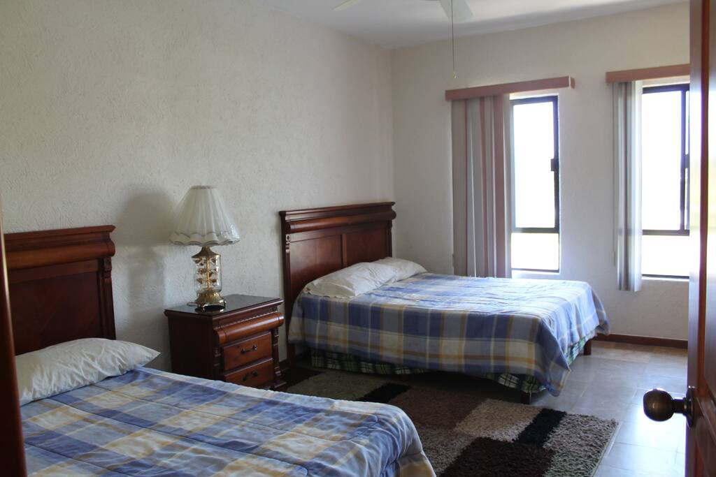 Bedroom with 2 full beds