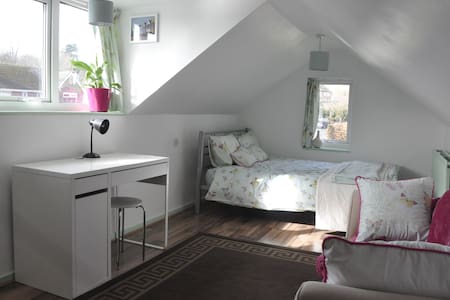 Light airy double loft room.