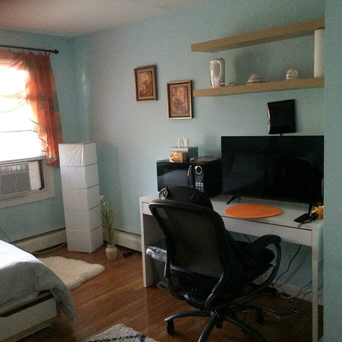 Window AC, WiFi, Smart TV with basic some HD channels, netflix and YouTube and microwave.