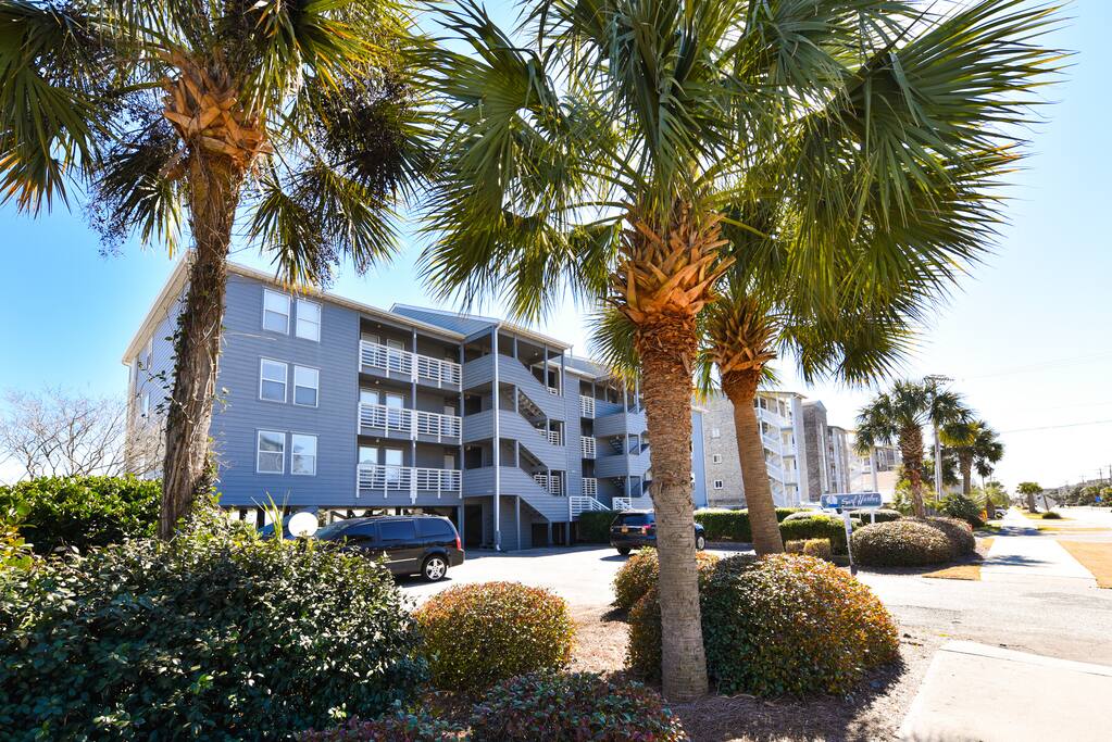 Street view. Surfside Beach has 4 story height limit so beach is not very crowded