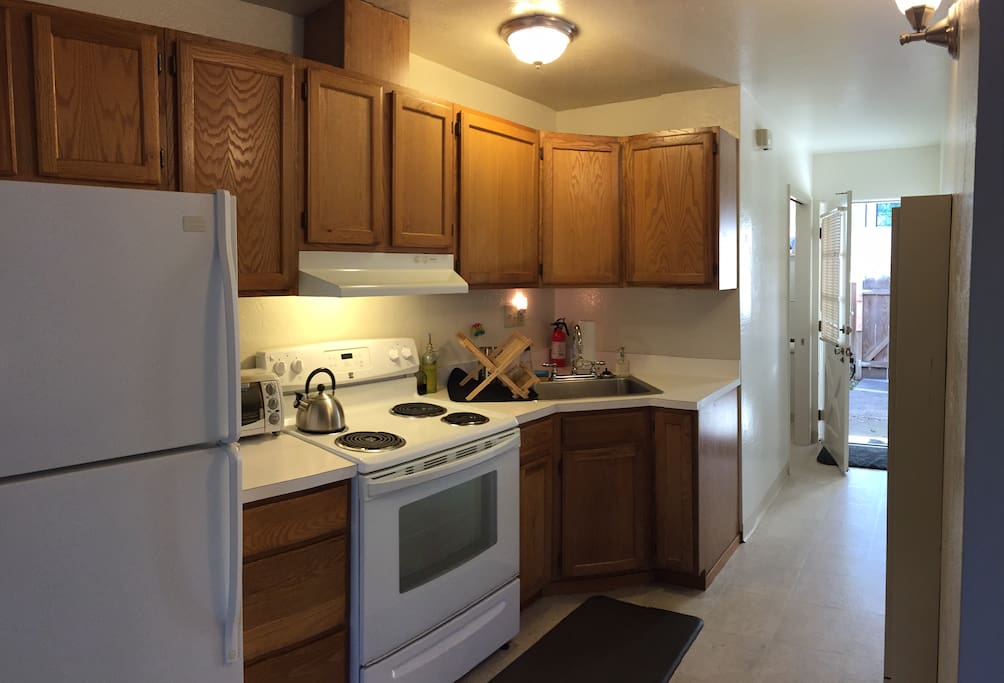 The kitchen is fully stocked. Plenty of appliances, utensils, and cookware to prepare a full meal.