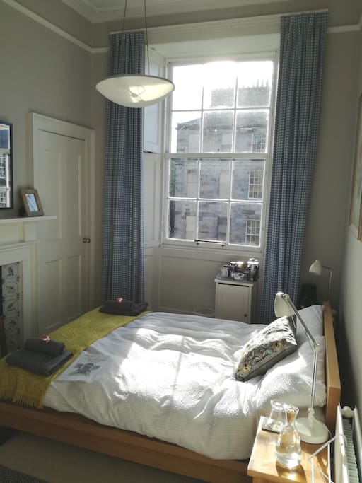 Lovely sunny bedroom to relax in