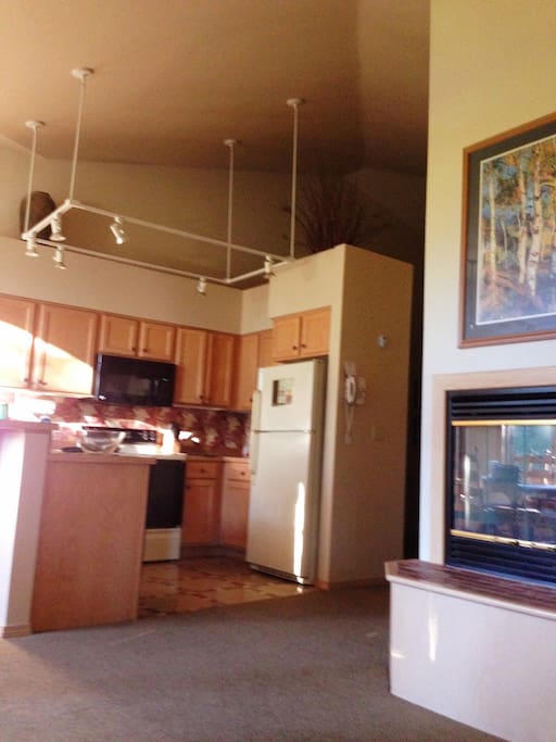 Kitchen has everything you would need. Just provide your own groceries. And there’s even a wood burning fireplace!