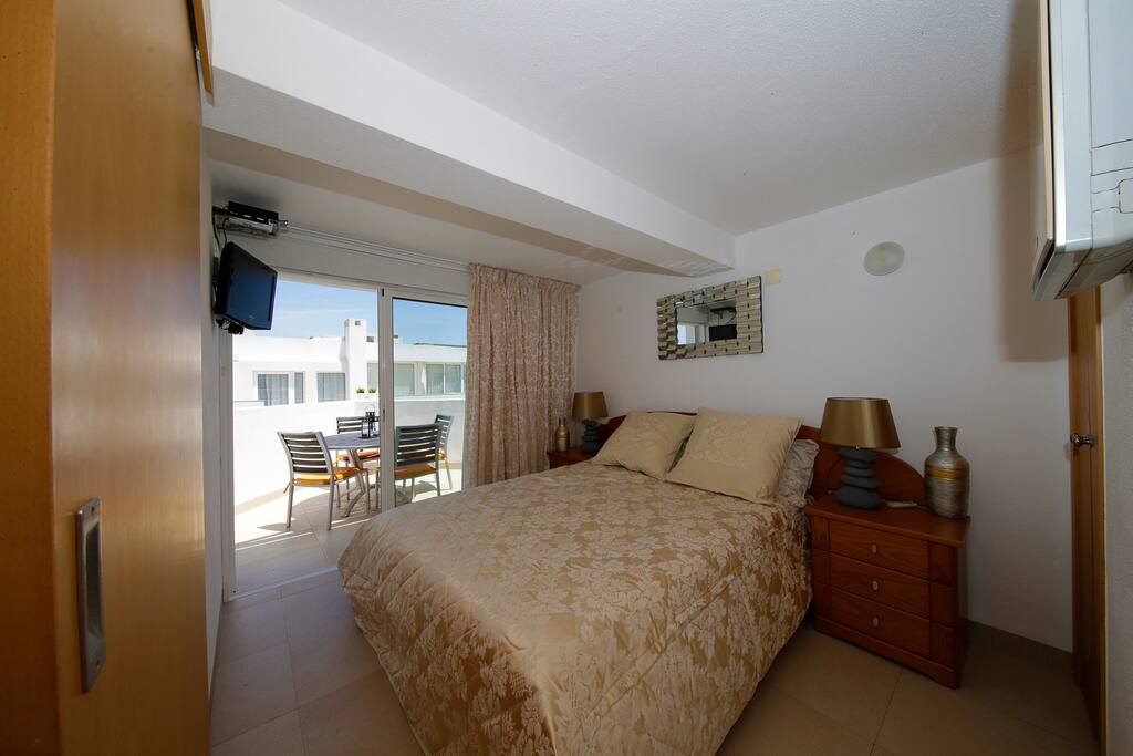 A Real double bed. Air con. TV.