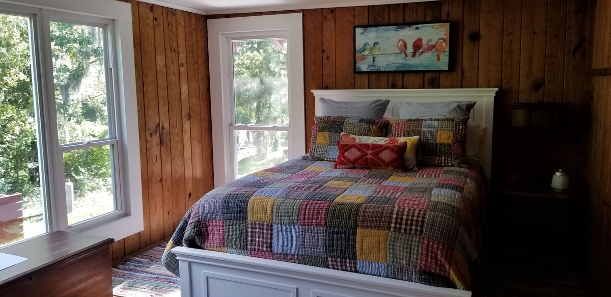 Bedroom with queen bed.