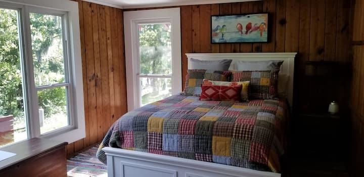 Bedroom with queen bed.