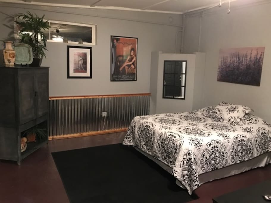 Queen bed in main room