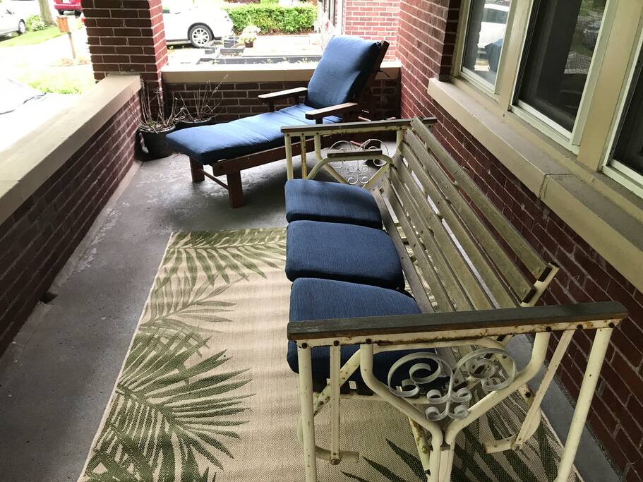 Covered porch with seating benches