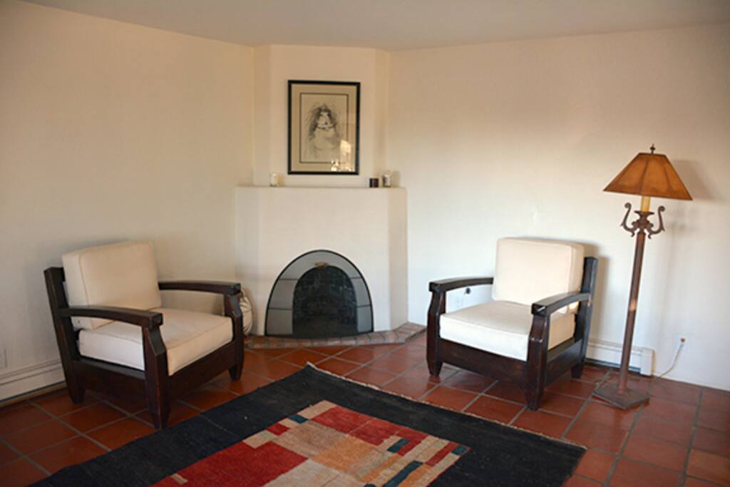 The Sitting Room is a separate area for conversation. This Gas-Fired Fireplace requires only the flick of a switch and a lighter. Please shut off the gas when finished.