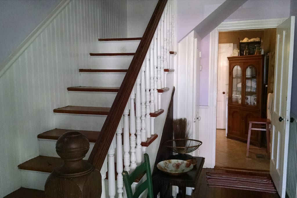 The front entry hall. Looking at the door to the downstairs bath.
