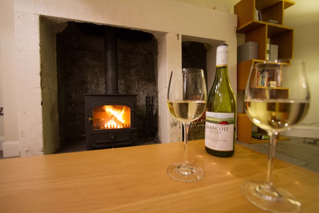 Curl up in front of the wood burning stove!