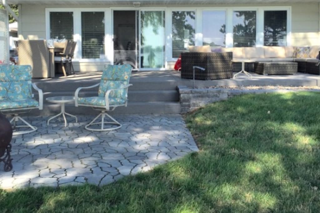 Outdoor Living Area, Nice Shade with sectional seating for 8, and outdoor dining for 6, and fire pit area with gorgeous view of lake.