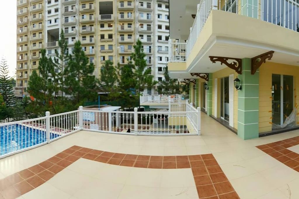 The Clubhouse with the gym at the top floor .