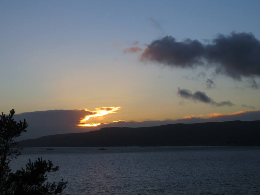 Sunset over The Cowal Peninsula. Viewed from living room.