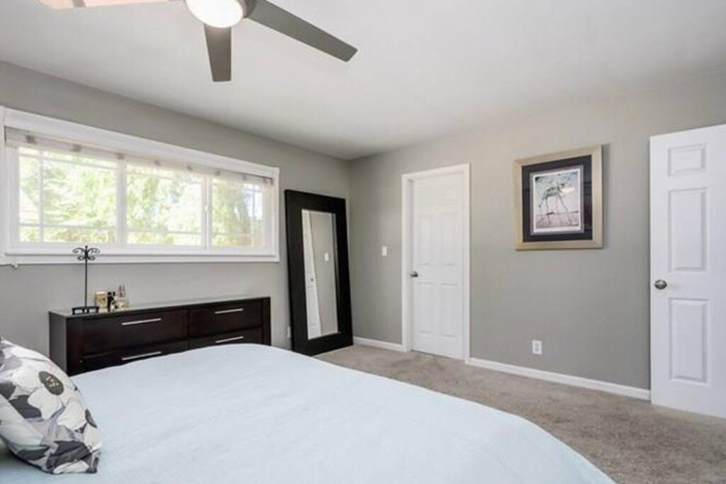 Large master bedroom with private closet and bathroom stocked with all the toiletries you need.
