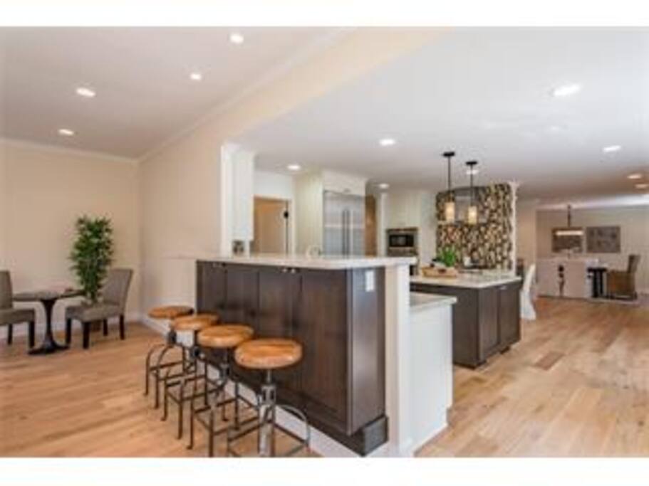 Family Room flows to Bar to Kitchen