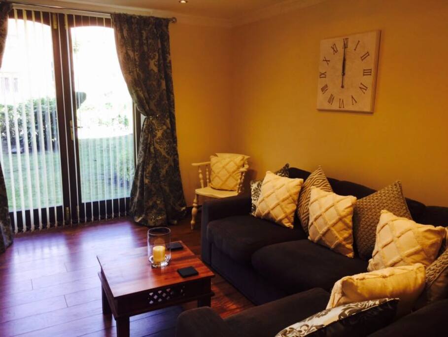Living area with French doors to communal garden