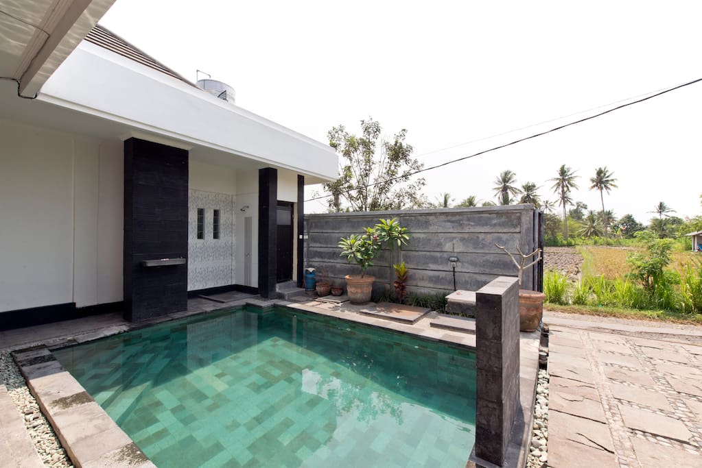 Swimming pool facing to the main exit door