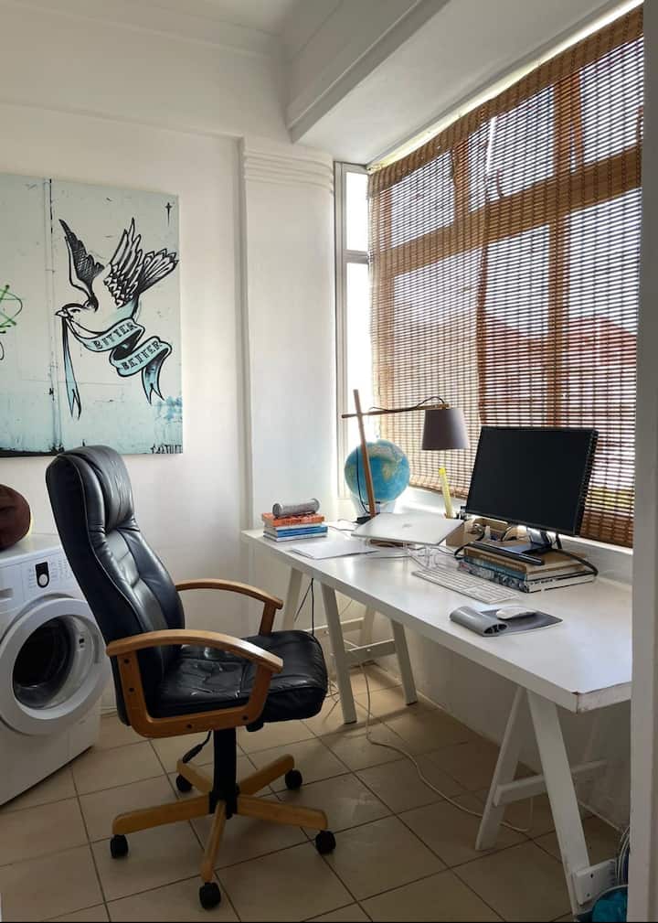 Workspace evidence from Sunny Top-Floor Apt · Home Office & Fiber Wi-Fi