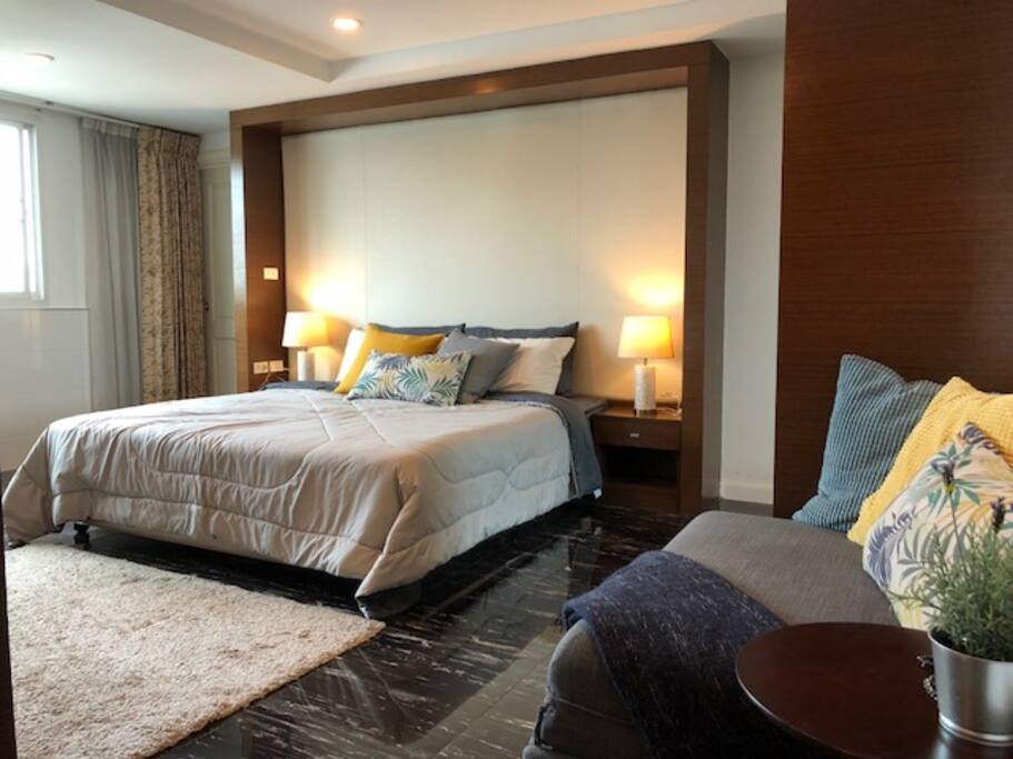 A king size bed and a sofa bed plus an extra mattress