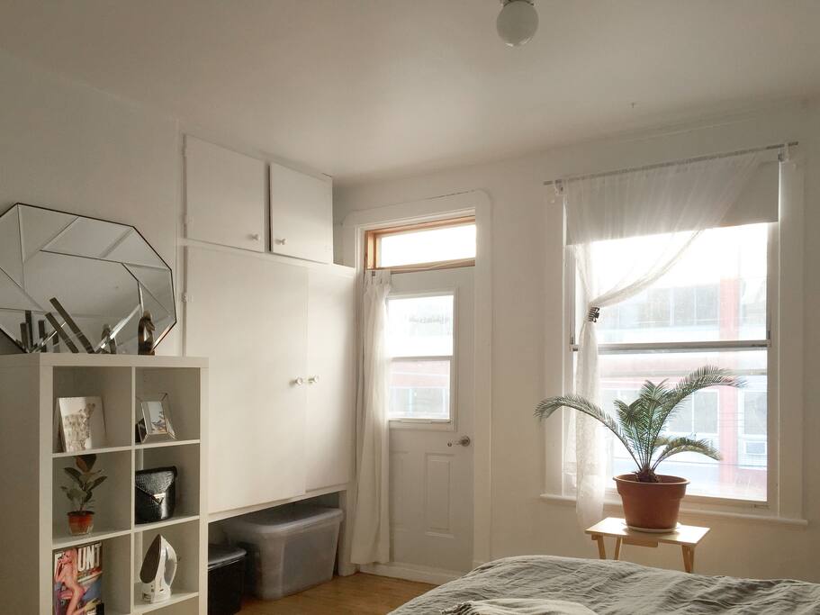 Bedroom and door to front balcony