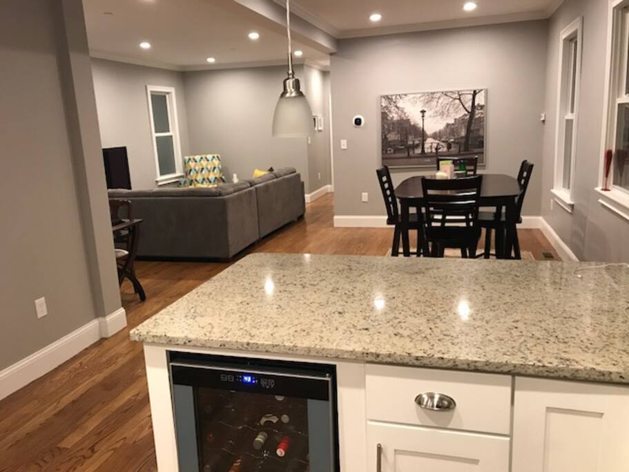 open concept kitchen leading to living room