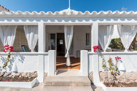 Top performing Airbnb: Extraordinary, cozy rustic house by the sea in Sant Lluís