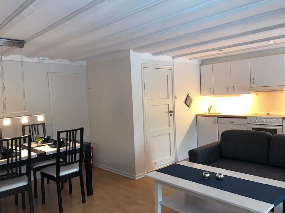 Dining area, kitchen and couch