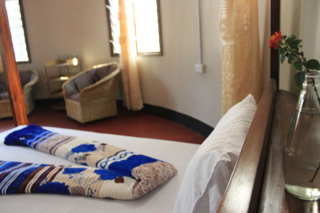 Amani room with comfortable queen size bed!