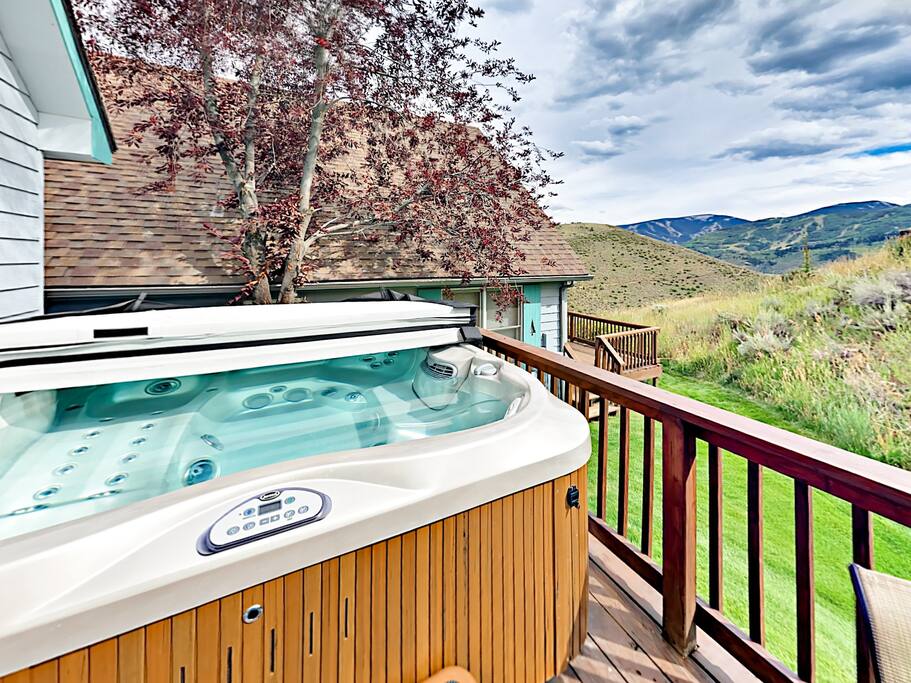 Relax and enjoy the view from your private hot tub.