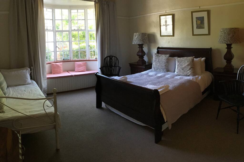 Bateleur guest room has Queen and single bed with ensuite (bath with shower over)